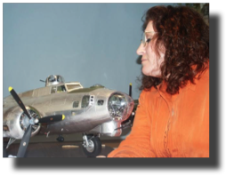 Clarisa Rojas Bazán staring at the all metal B-17 scale model. Clarisa Rojas Bazán staring at the all metal B-17 scale model.