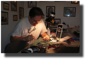 Model Maker.-Guillermo Rojas Bazán in his studio in Royal Oak MI, working on his model of Curtiss Goshawk. Model Maker.-Guillermo Rojas Bazán in his studio in Royal Oak MI, working on his model of Curtiss Goshawk.
