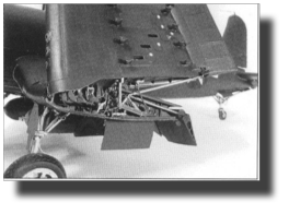 F4U-1 Corsair. Attachment of outer panel. Rod, bolts and link assem. Scratch built in metal by Rojas Bazán. Scale 1:15. Engineering model. F4U-1 Corsair. Attachment of outer panel. Rod, bolts and link assem. Scratch built in metal by Rojas Bazán. Scale 1:15. Engineering model.